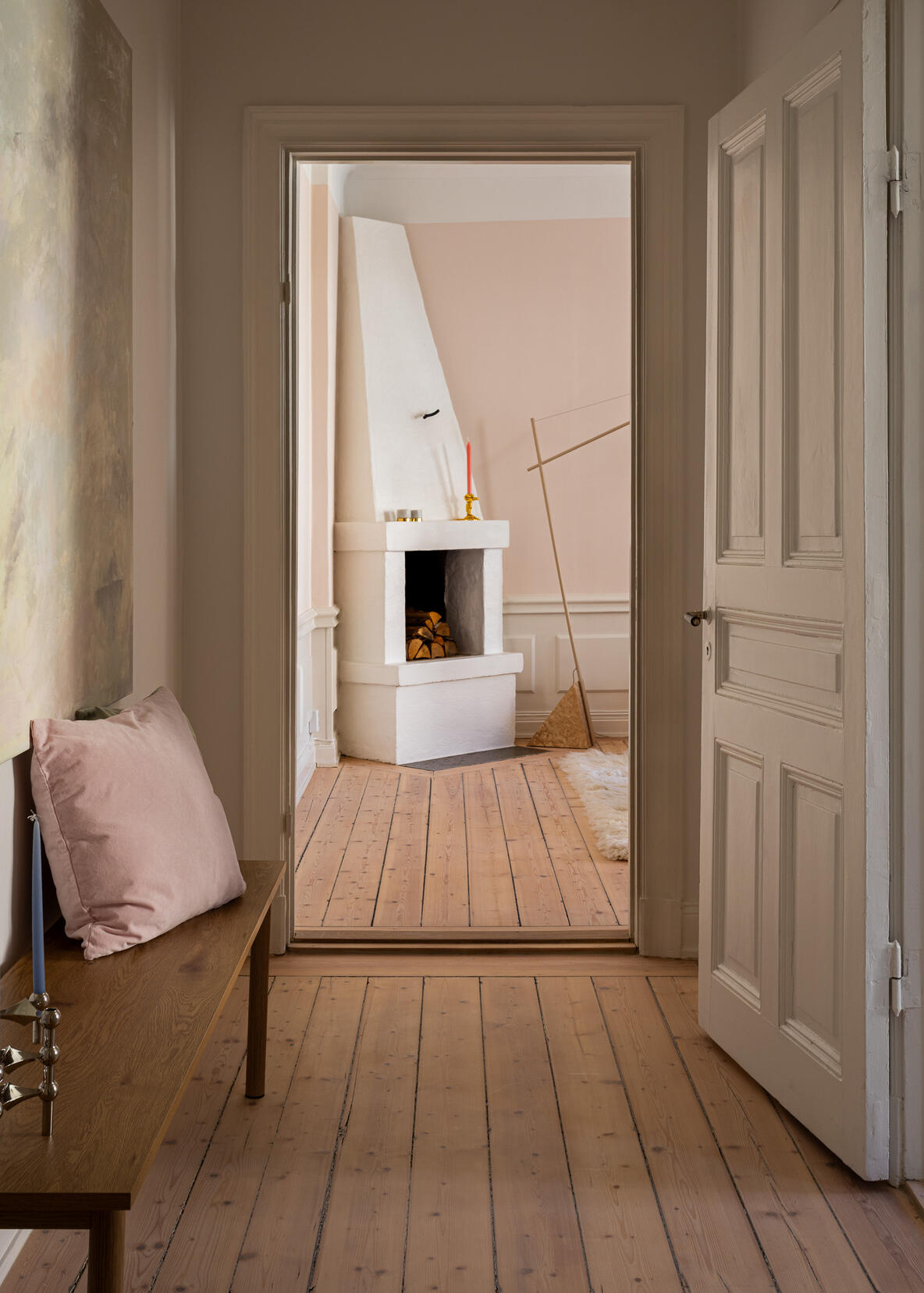 Interior photograph of a light-filled Stockholm living room with vintage furniture, contemporary art and original period details. Interior photograph of a light-filled Stockholm living room with vintage furniture, contemporary art and original period details.